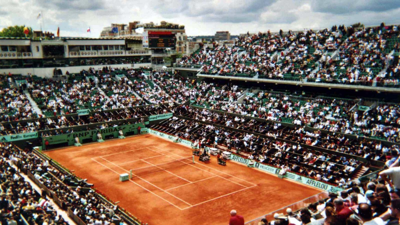 Yellow balls on red clay at the Roland-Garros